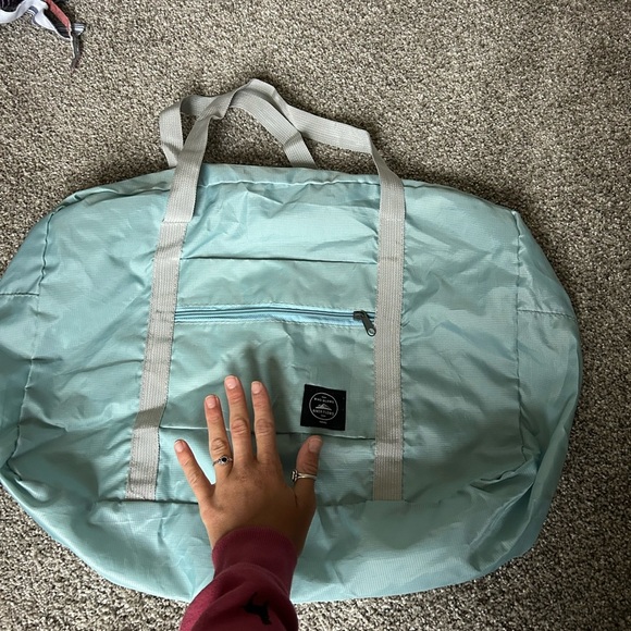 Wind blows river flows blue water proof large duffel bag - Picture 6 of 6